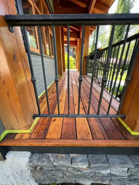 Inner-city Calgary deck after wood refinishing by Dynamic Painting