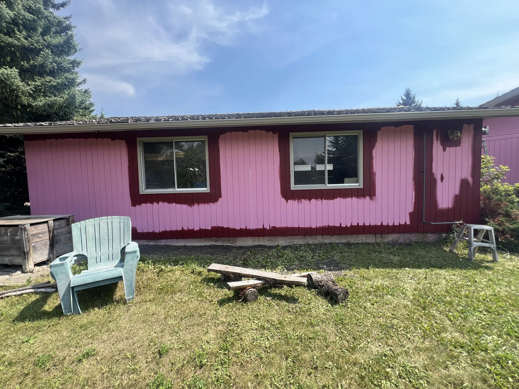 Calgary bungalow exterior painting colour change in progress