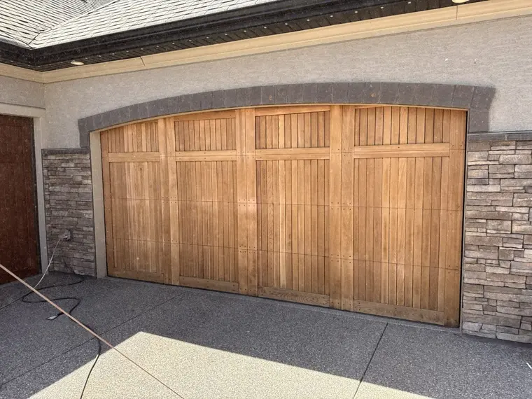 Sanded wood garage door in Cranston before refinishing