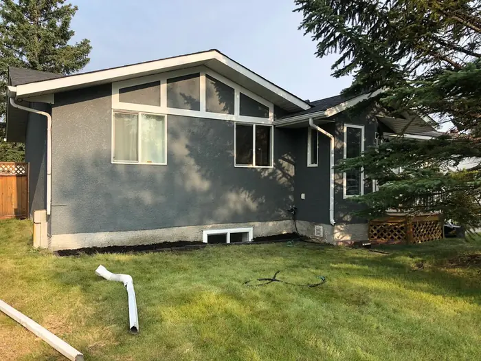 Stucco wall after repair and finished coating